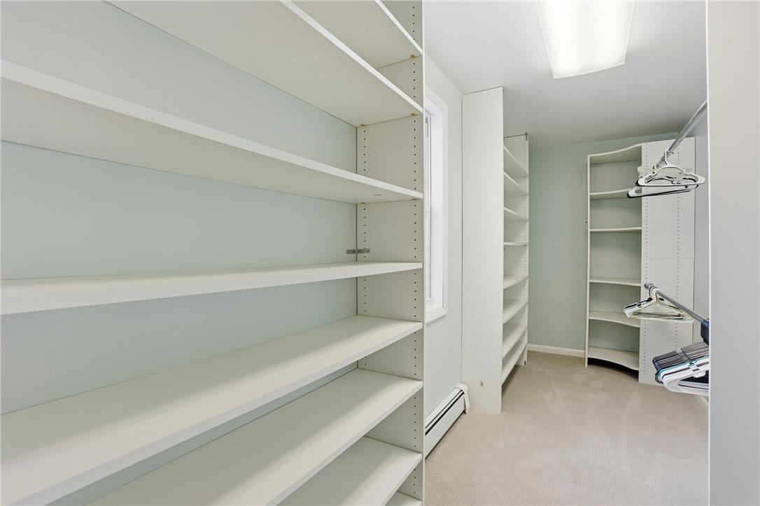 6271 Batman Road Zionsville, PA 18092 - Photo 53 of 100 Ample shelving and hanging space in this well-organized walk-in closet.