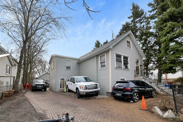 a car parked in front of a house