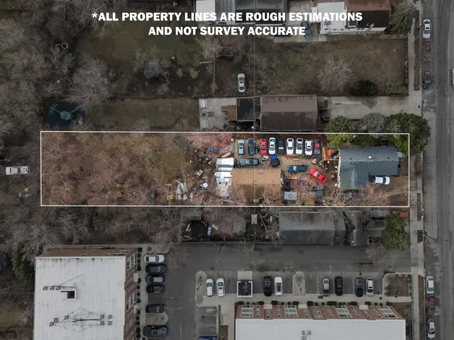 a store room with lots of different colored cloths