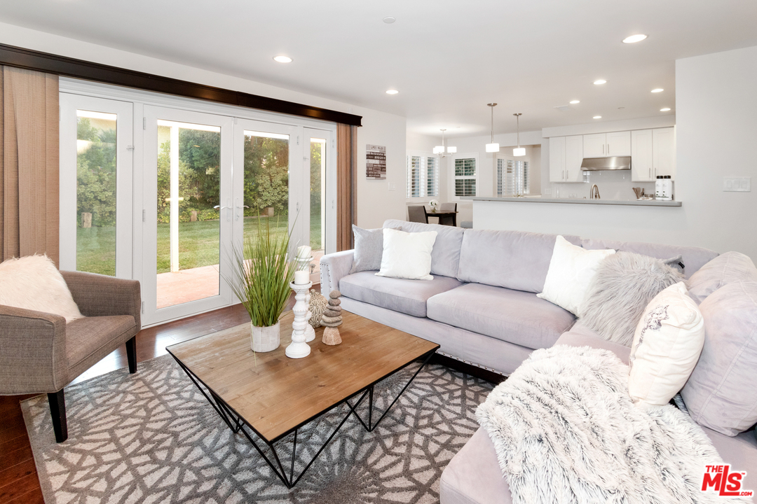 23030 Humming Bird Way Calabasas, CA 91302 - Photo 15 of 32 a living room with furniture and a large window