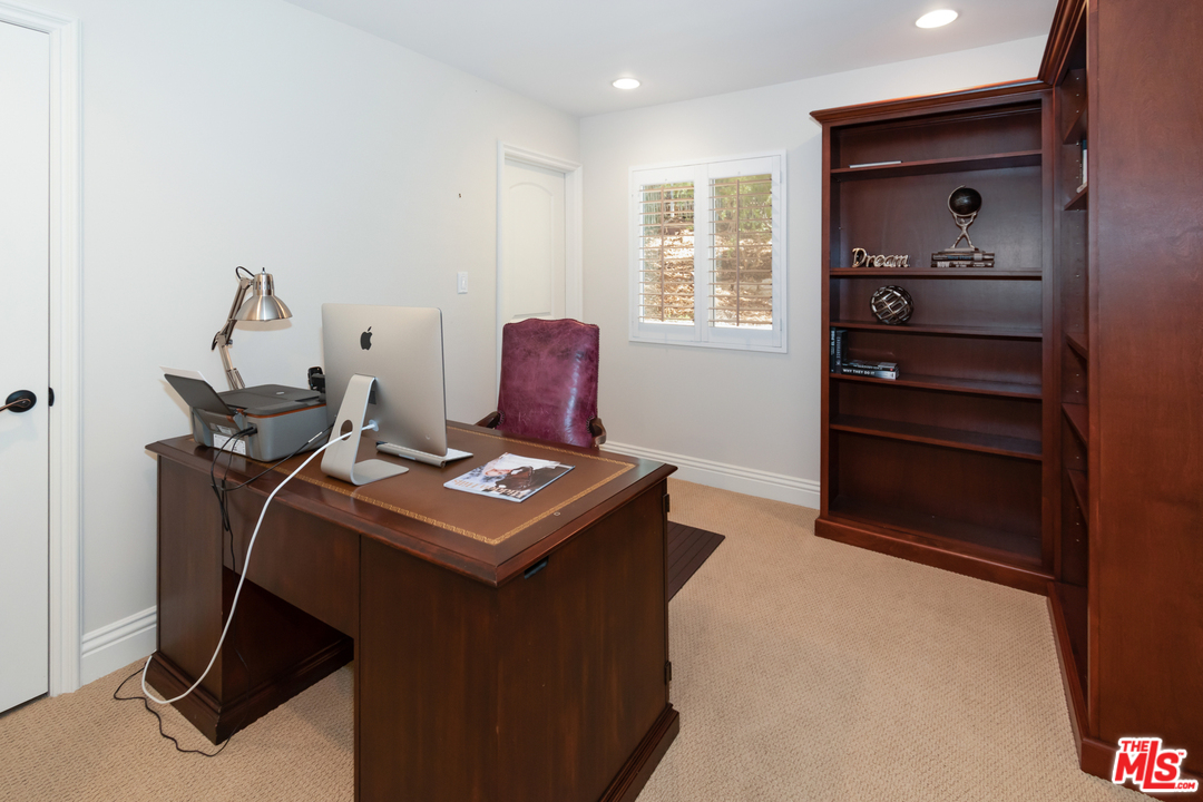 23030 Humming Bird Way Calabasas, CA 91302 - Photo 26 of 32 a room with furniture and window