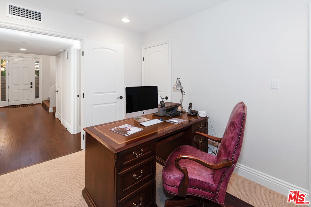 23030 Humming Bird Way Calabasas, CA 91302 - Photo 27 of 32 a view of a workspace with furniture