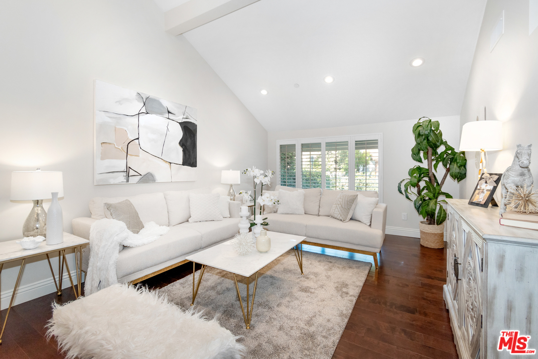 23030 Humming Bird Way Calabasas, CA 91302 - Photo 6 of 32 a living room with furniture and a large window