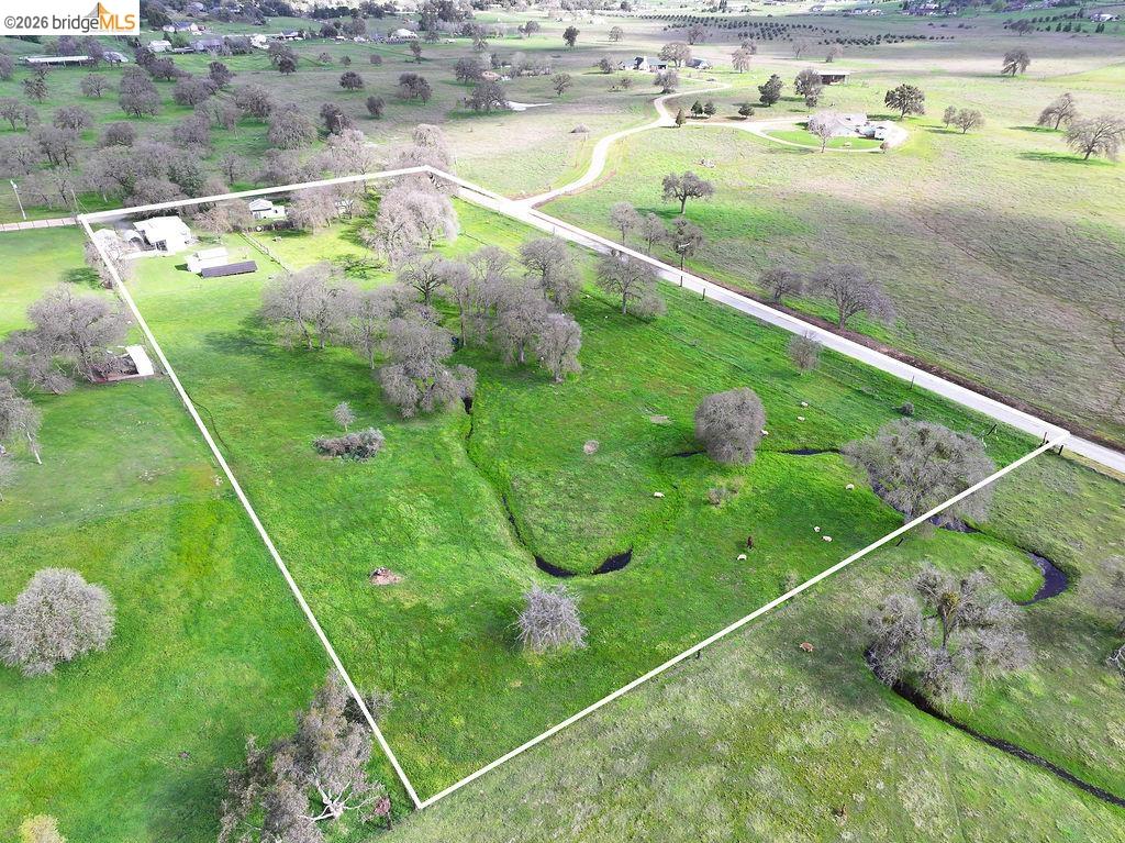 7550 Adams Road Valley Springs, CA 95252 - Photo 38 of 38 Overview of rural landscape featuring property boundaries highlighted