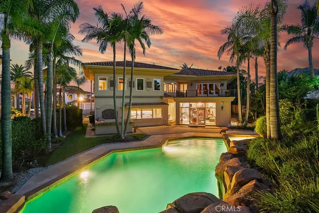 a view of a swimming pool with a garden