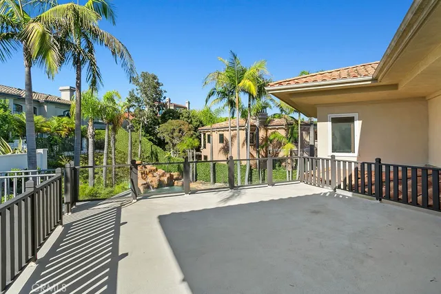 a balcony view with a garden space