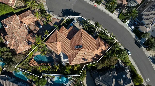 an aerial view of a house with balcony