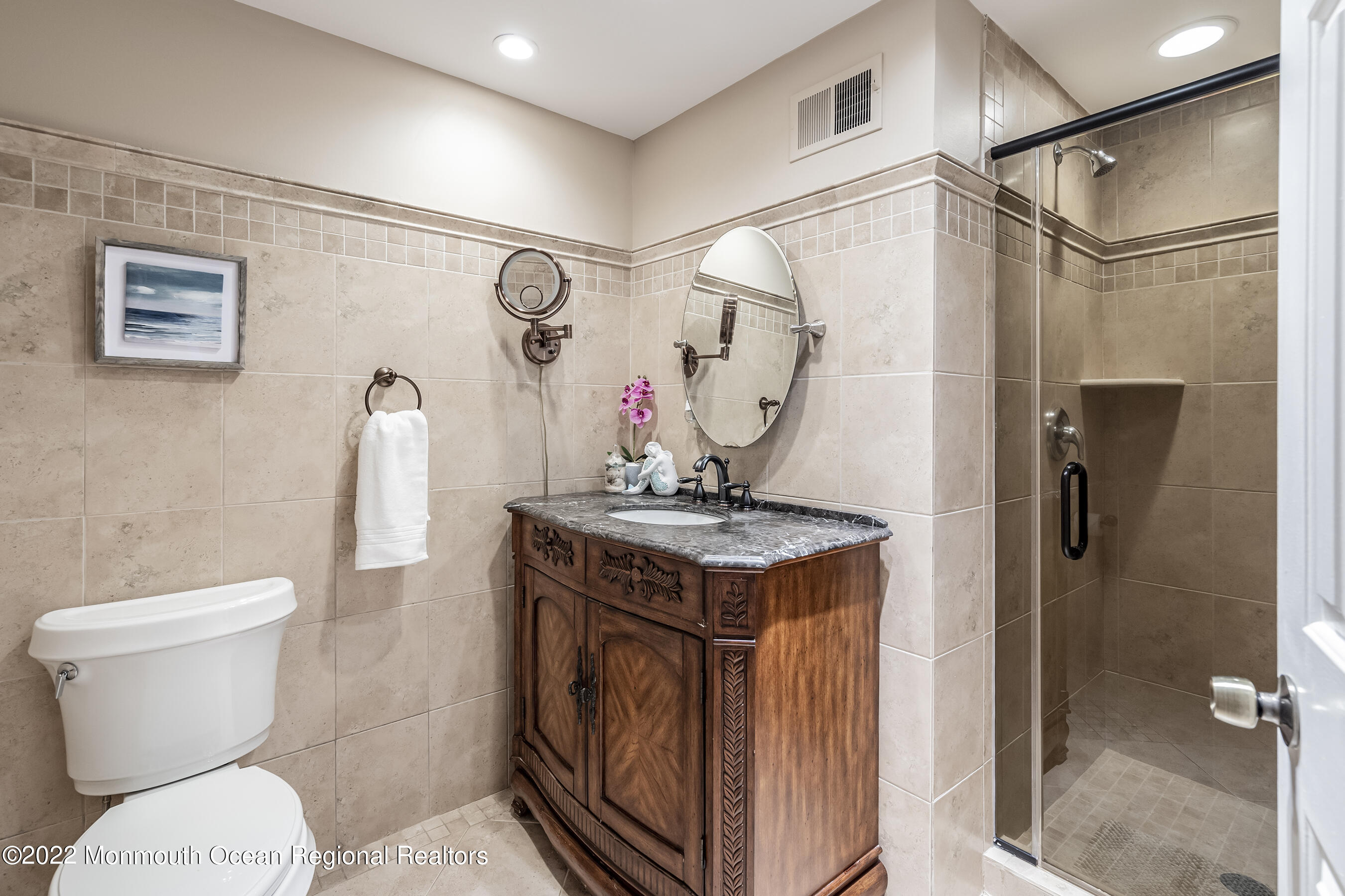 44 Mermaid Road Toms River, NJ 08753 - Photo 59 of 63 a bathroom with a granite countertop sink toilet and shower