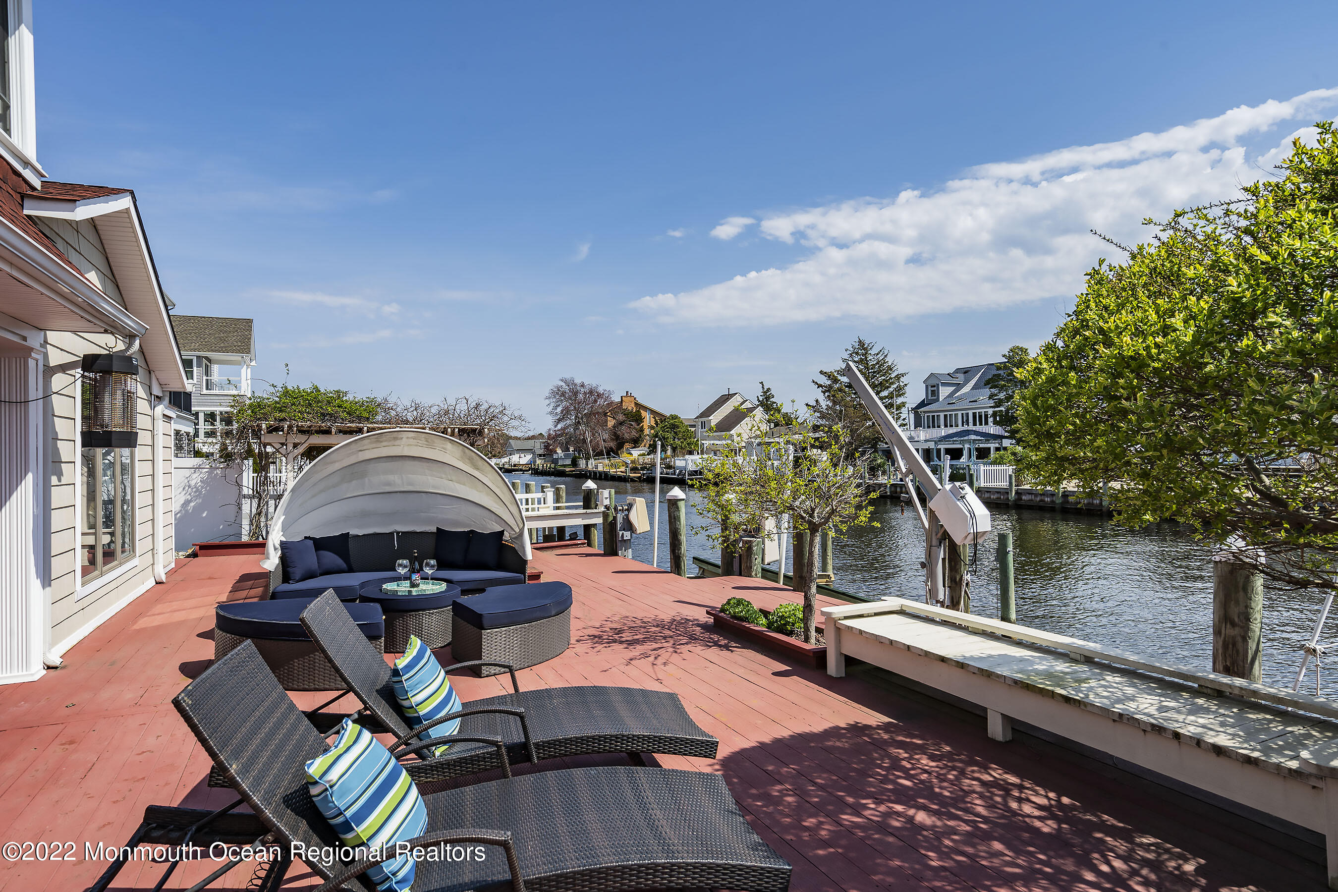 44 Mermaid Road Toms River, NJ 08753 - Photo 7 of 63 a view of a swimming pool with lounge chairs in patio