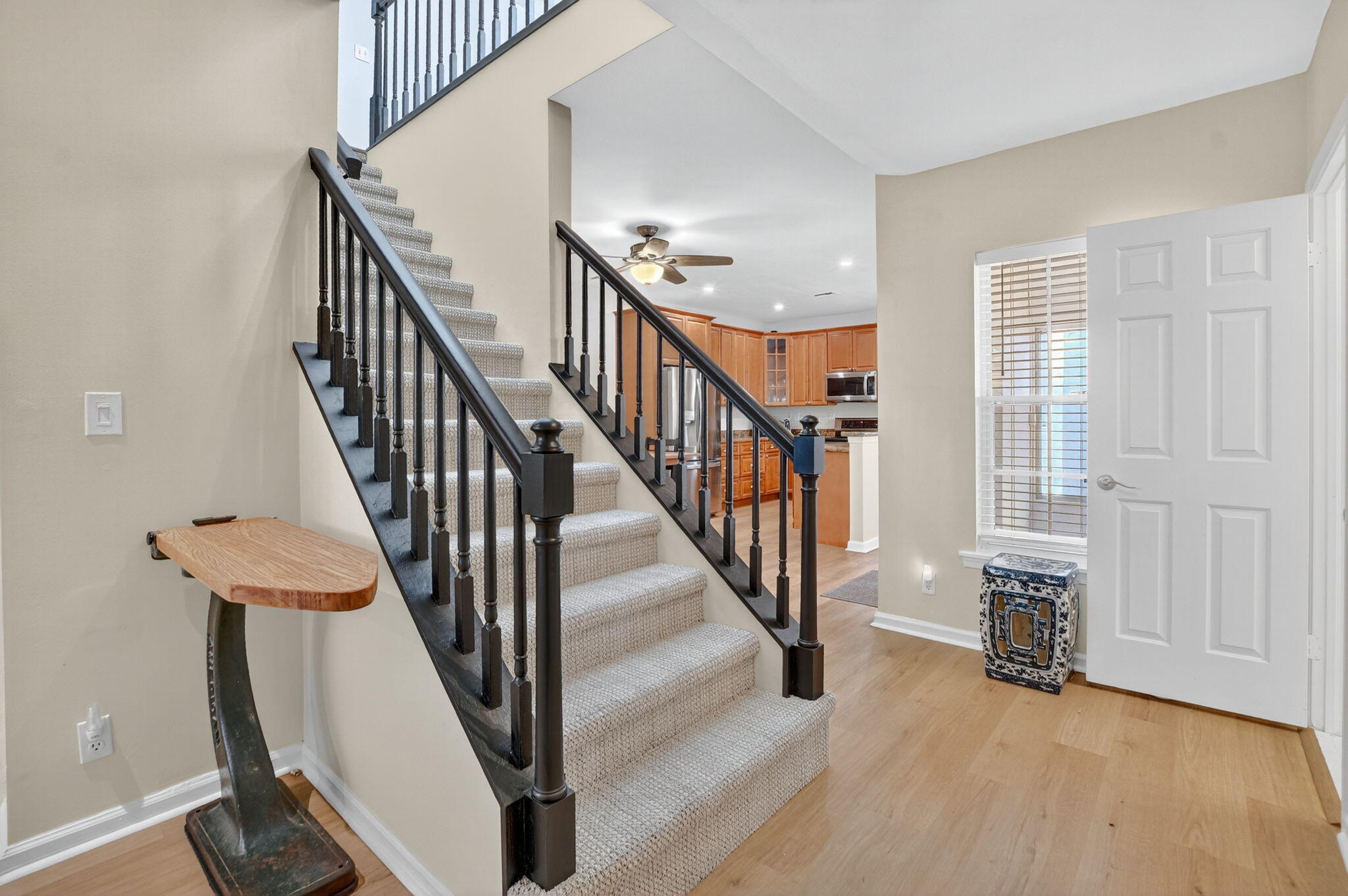 5908 Catesby Street Boca Raton, FL 33433 - Photo 20 of 49 a view of a hallway with wooden floor and stairs