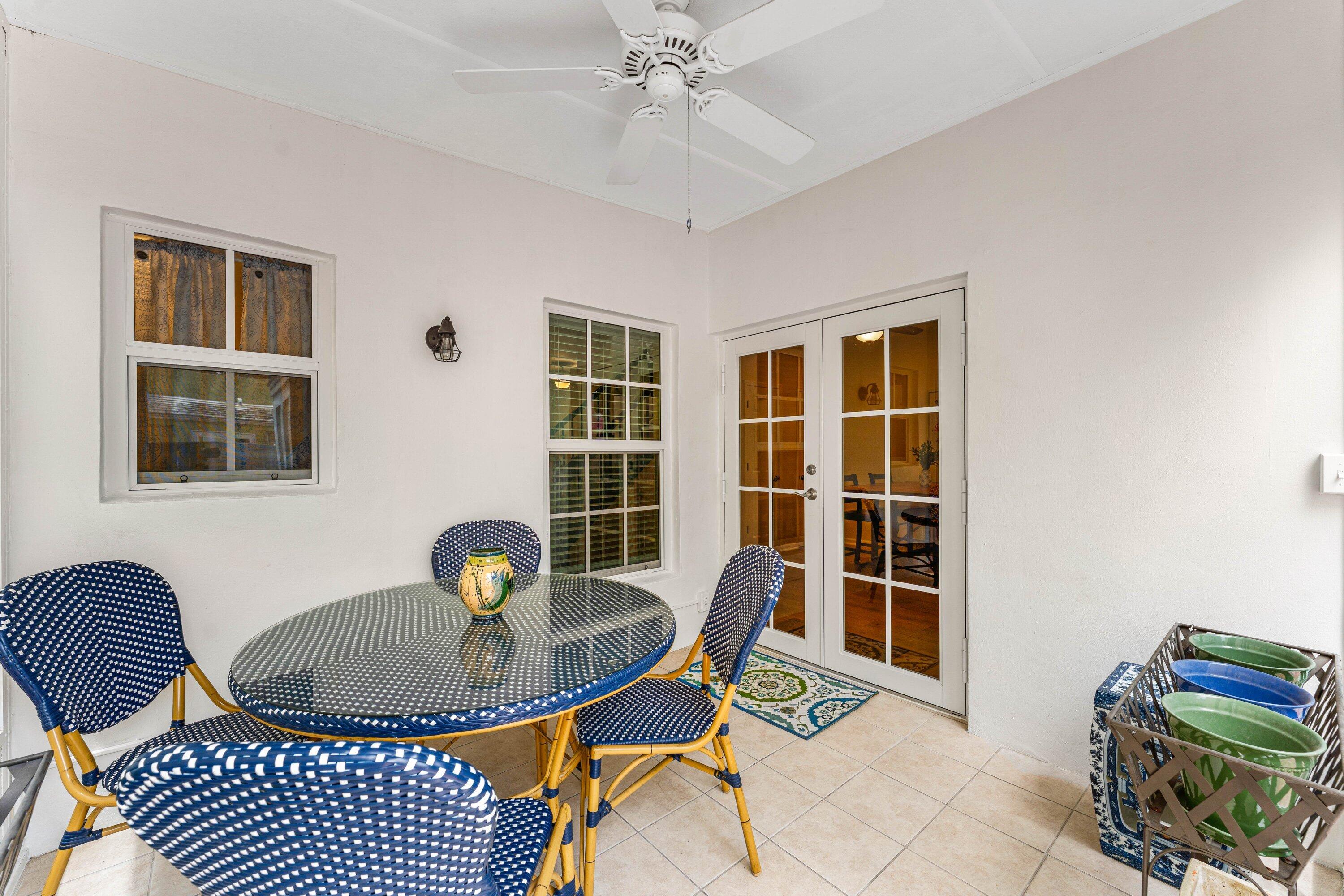 5908 Catesby Street Boca Raton, FL 33433 - Photo 28 of 49 a dining room with furniture and window