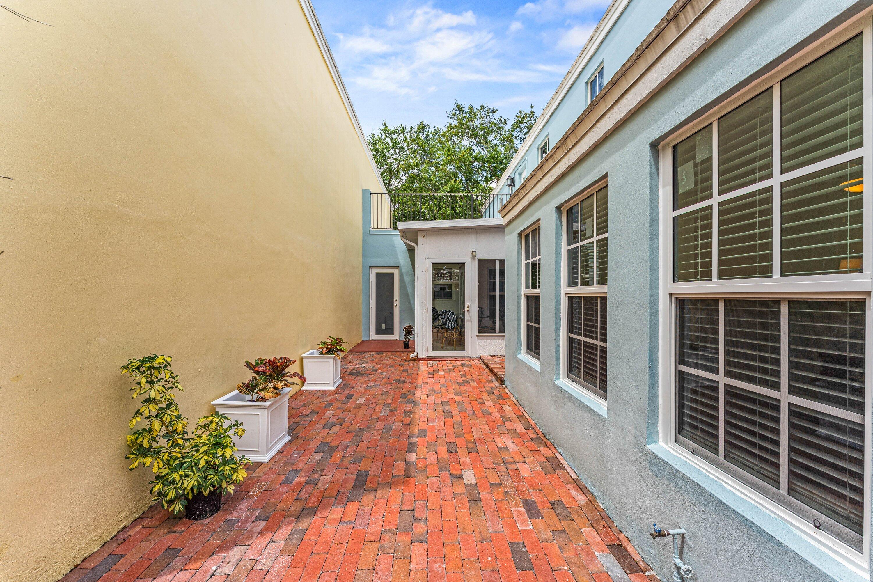5908 Catesby Street Boca Raton, FL 33433 - Photo 30 of 49 a view of porch with a potted plant