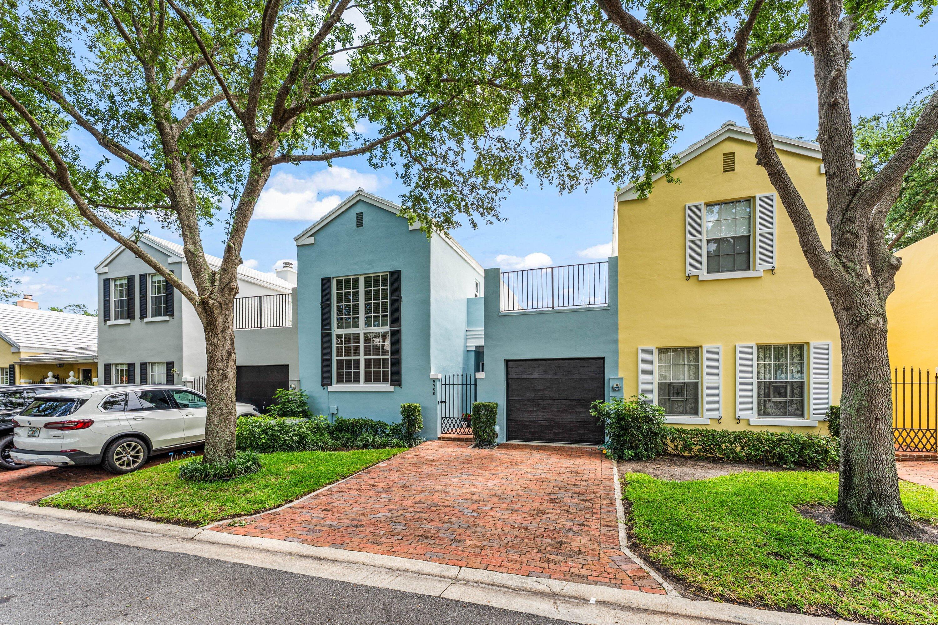 5908 Catesby Street Boca Raton, FL 33433 - Photo 3 of 49 a house view with a garden space