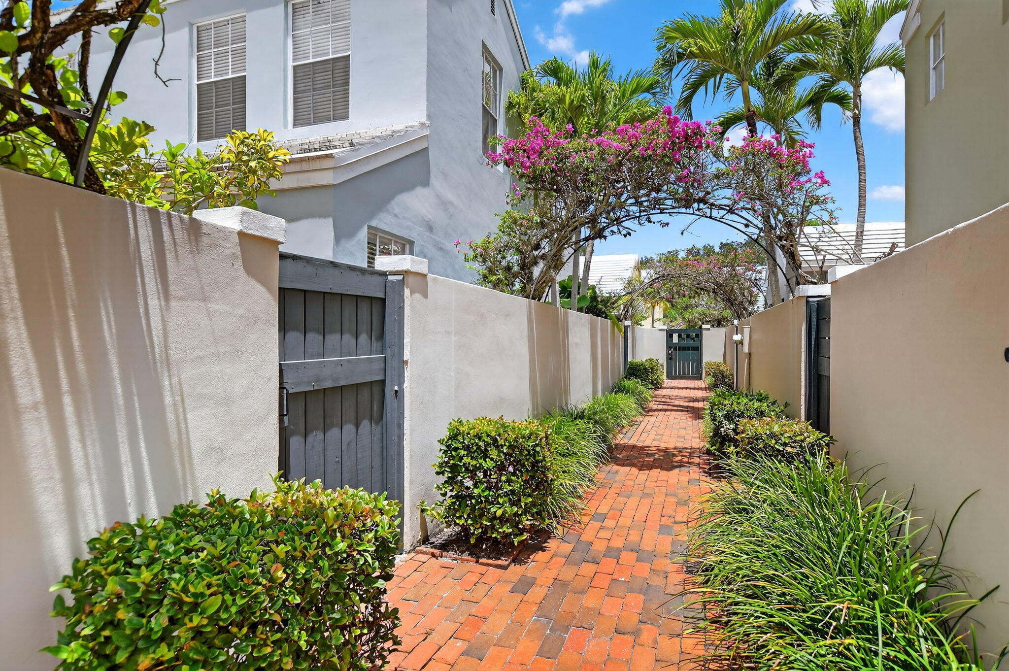 5908 Catesby Street Boca Raton, FL 33433 - Photo 32 of 49 a view of a pathway with flower plants
