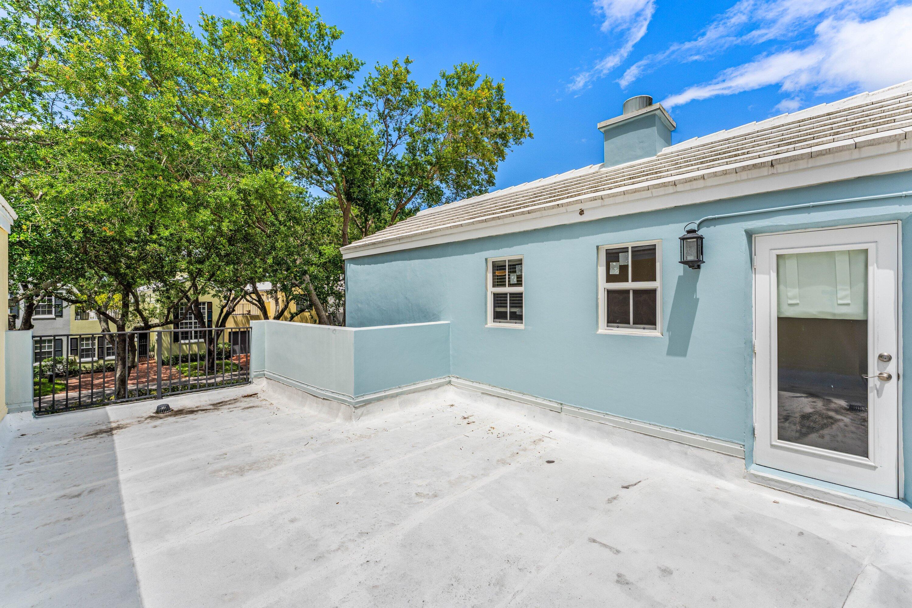 5908 Catesby Street Boca Raton, FL 33433 - Photo 35 of 49 a view of a house with a outdoor space