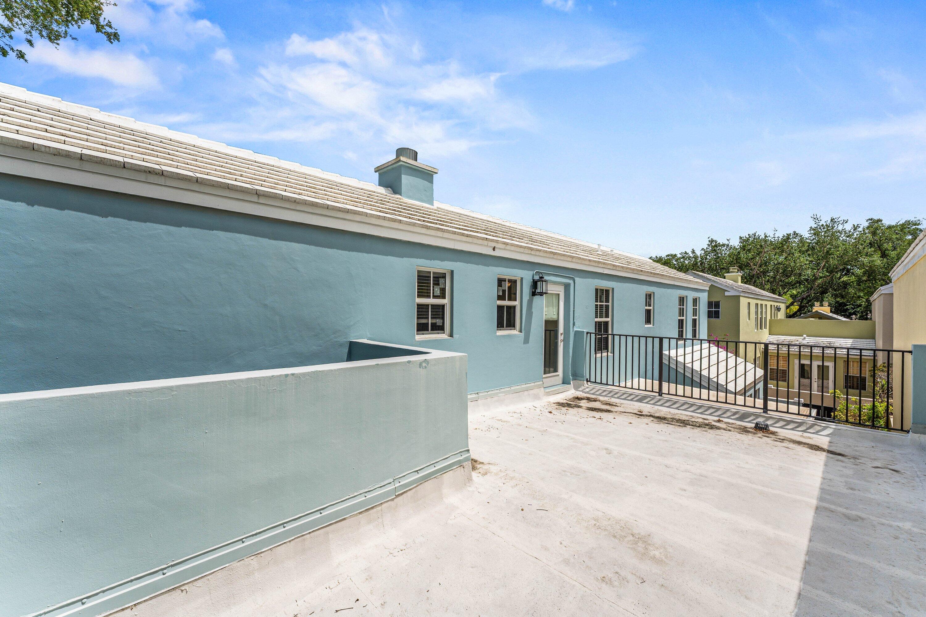 5908 Catesby Street Boca Raton, FL 33433 - Photo 37 of 49 a view of a house with a roof deck