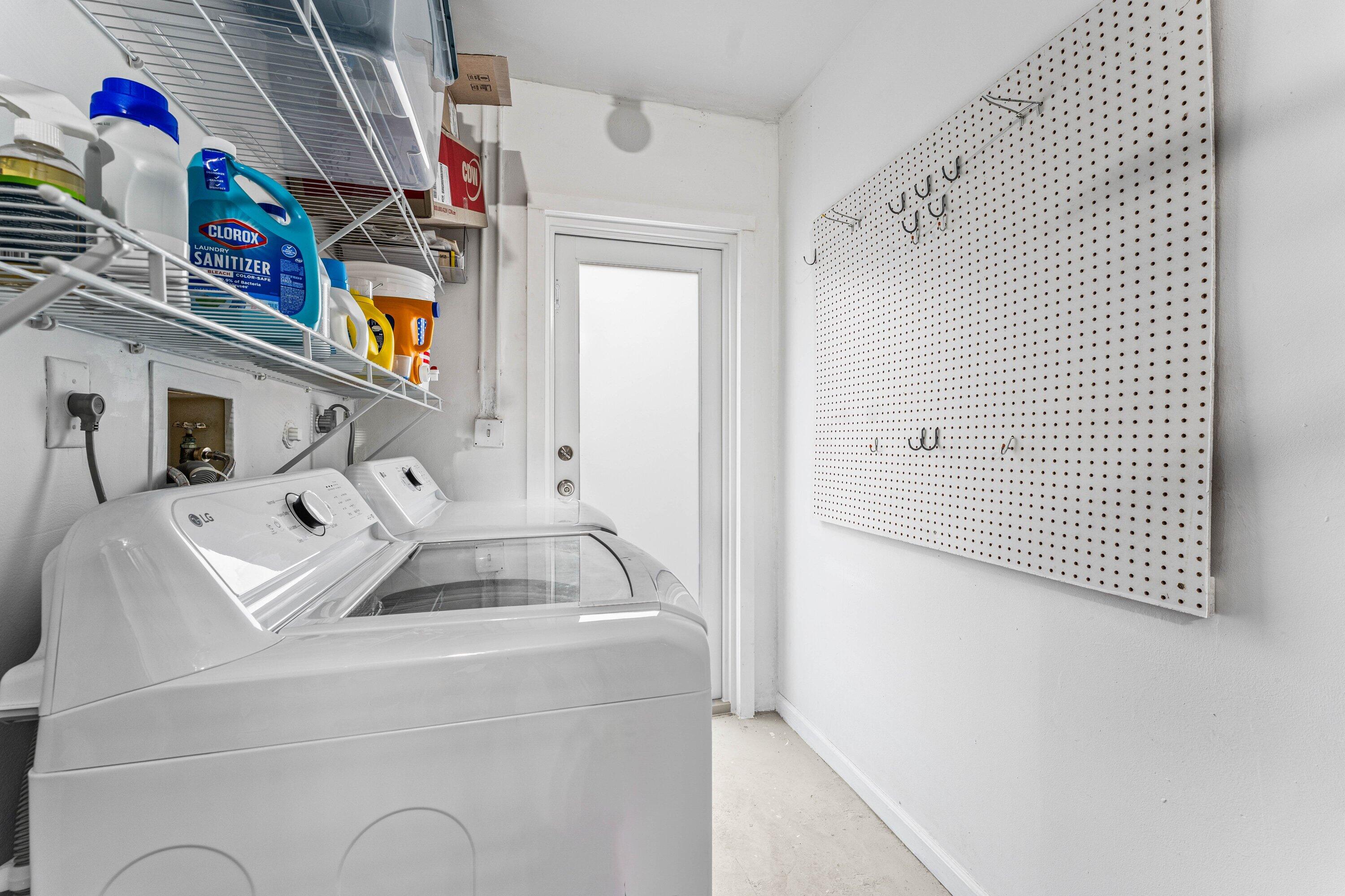5908 Catesby Street Boca Raton, FL 33433 - Photo 38 of 49 a utility room with dryer and washer