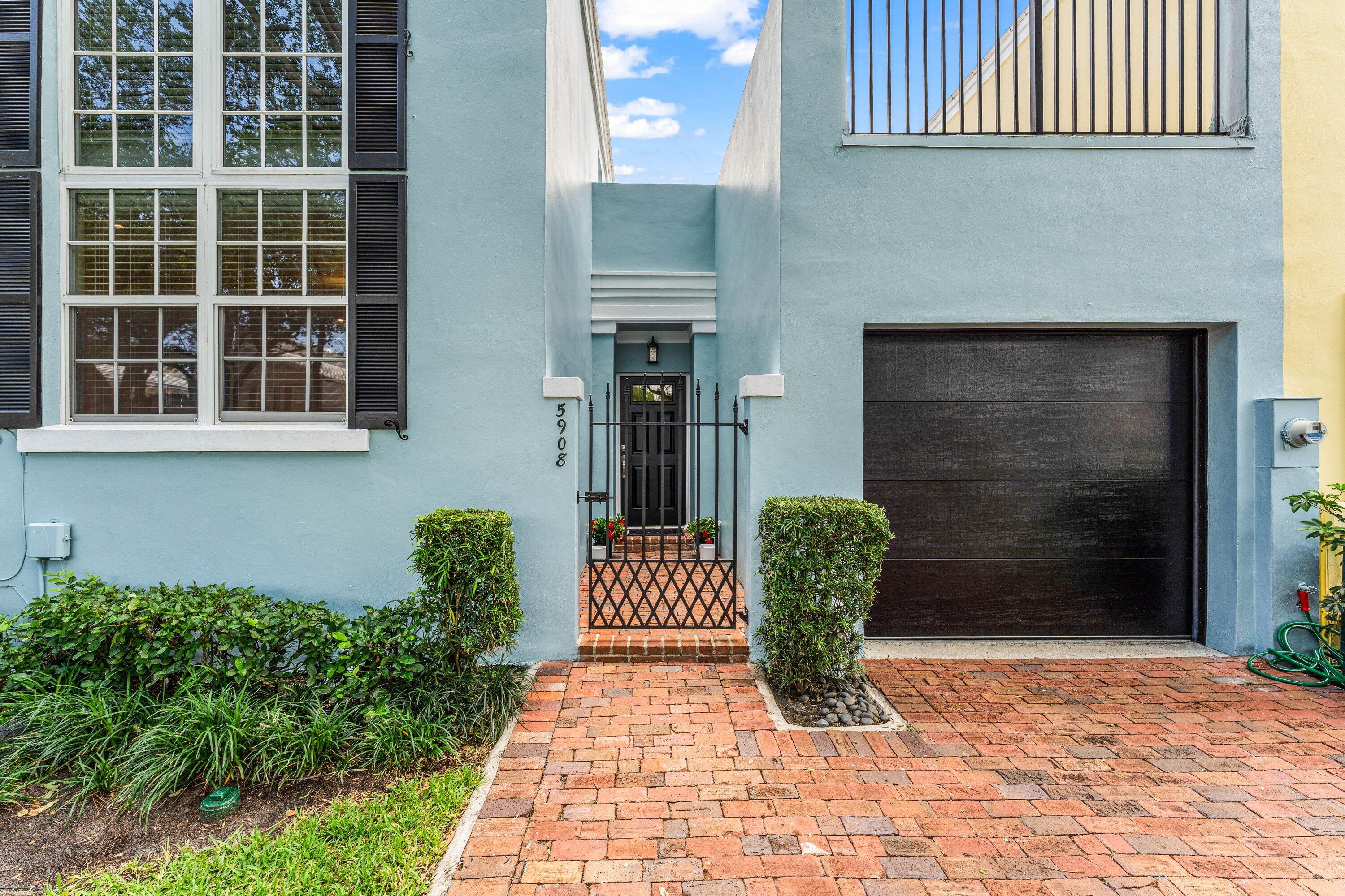 5908 Catesby Street Boca Raton, FL 33433 - Photo 4 of 49 a front view of a house