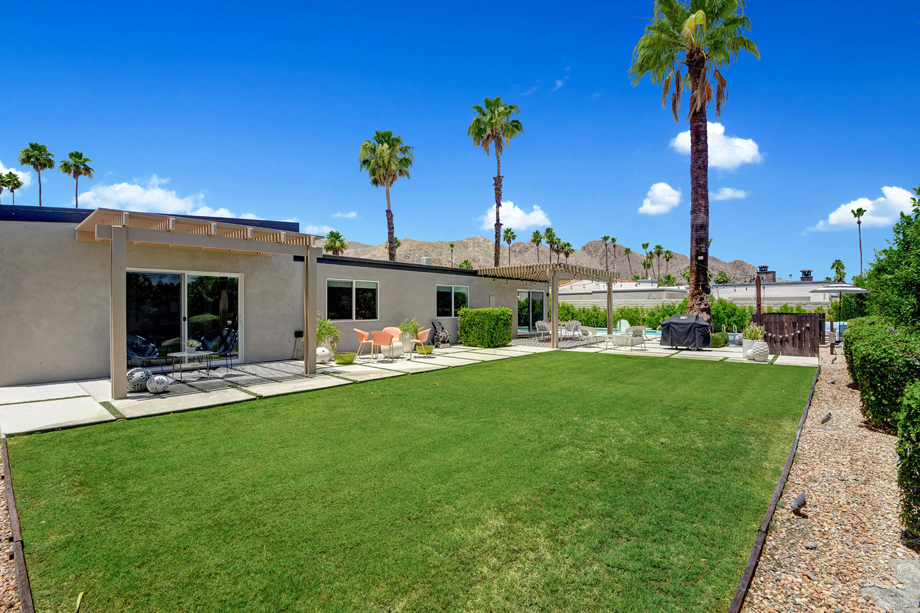 71492 Estellita Drive Rancho Mirage, CA 92270 - Photo 30 of 39 68 GRASS YARD TO HOUSE POOL AND MOUNTAIN