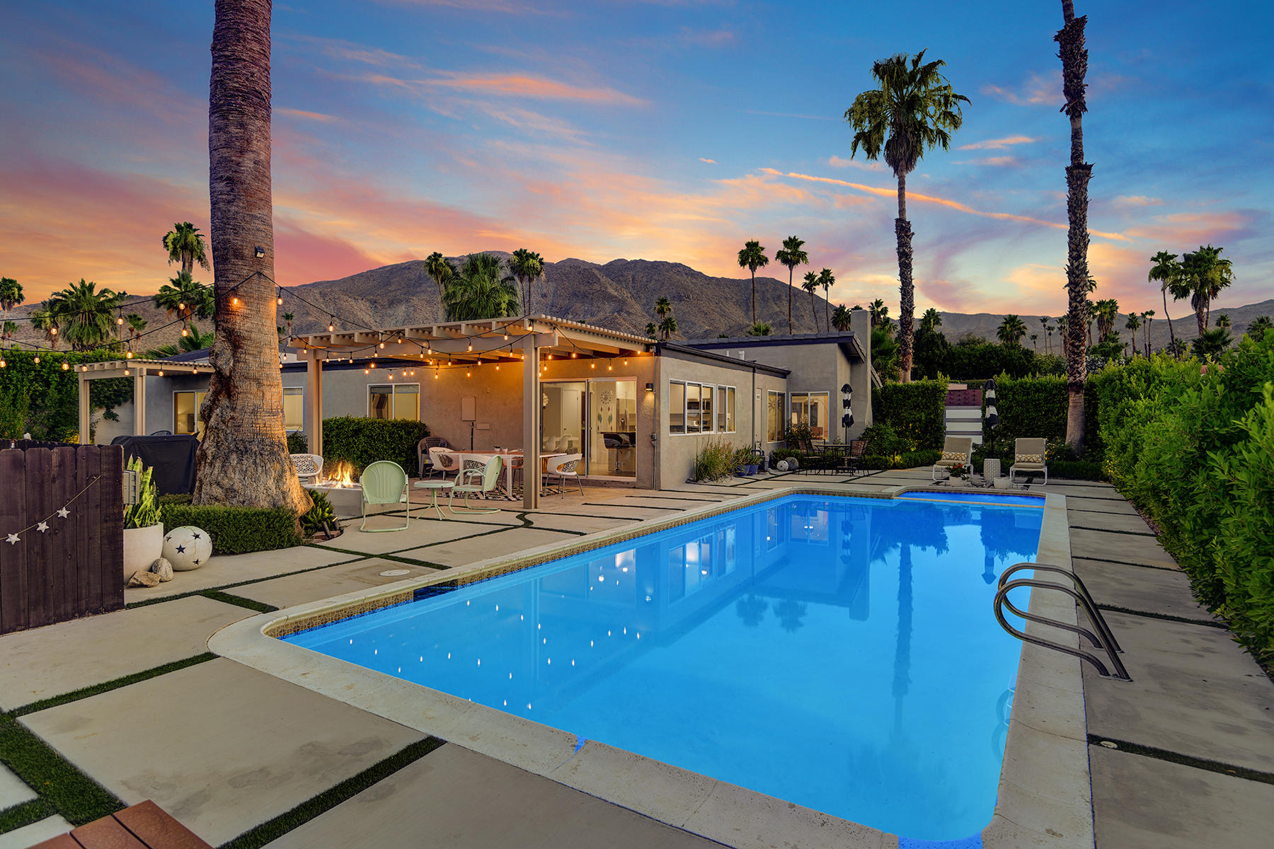 71492 Estellita Drive Rancho Mirage, CA 92270 - Photo 36 of 39 83 POOL TO HOUSE AND MOUNTAINS ANGLED NI