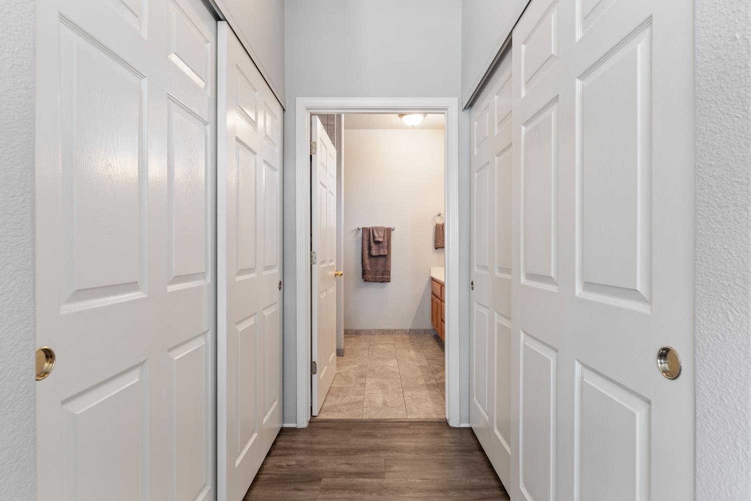3300 Spring Garden Drive Turlock, CA 95382 - Photo 23 of 34 a view of a bathroom from the hallway