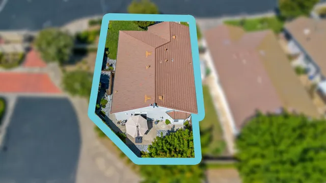 a picture of a bench in front of a wall