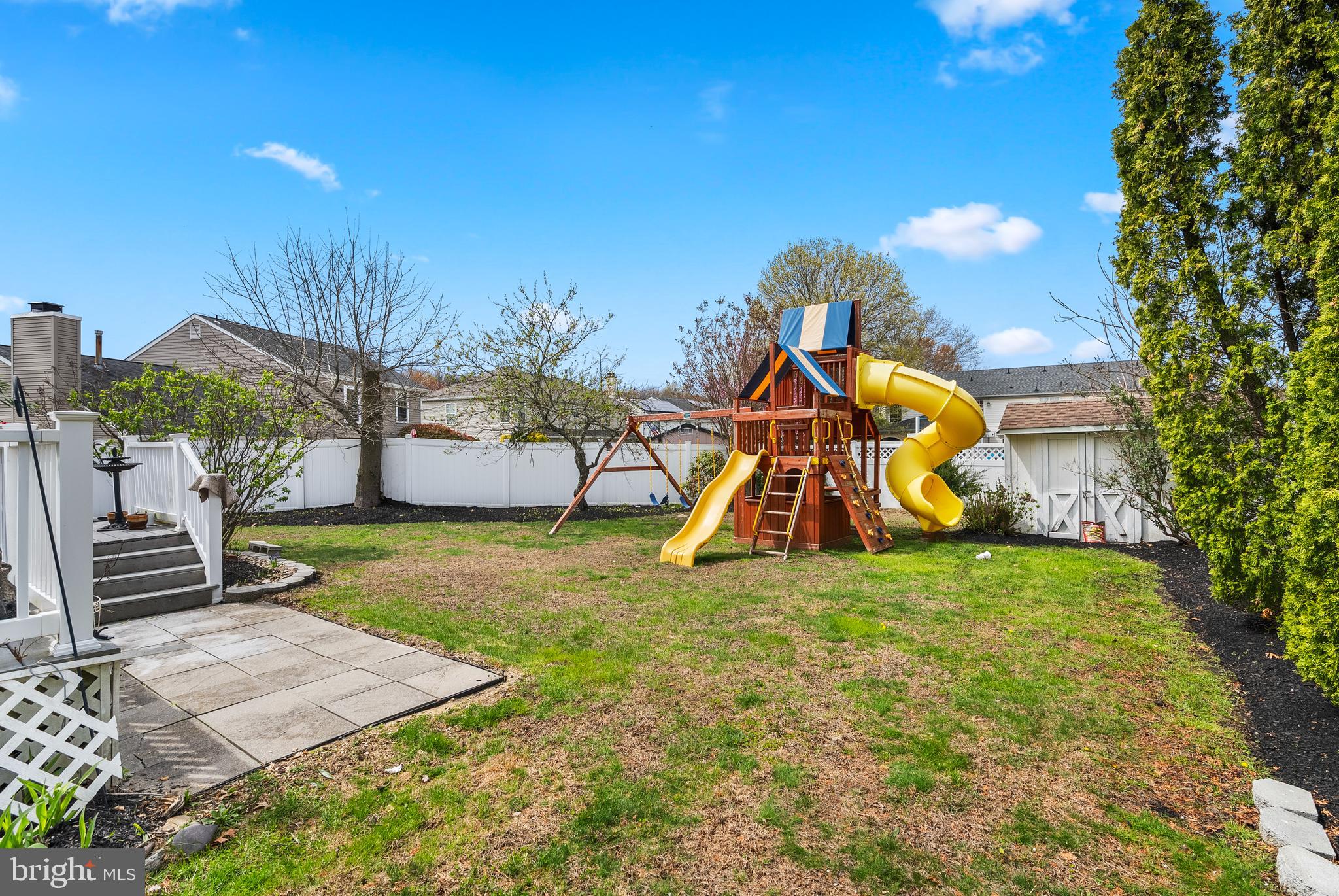 10 Winfield Circle Sewell, NJ 08080 - Photo 32 of 37 a backyard of a house with table and chairs