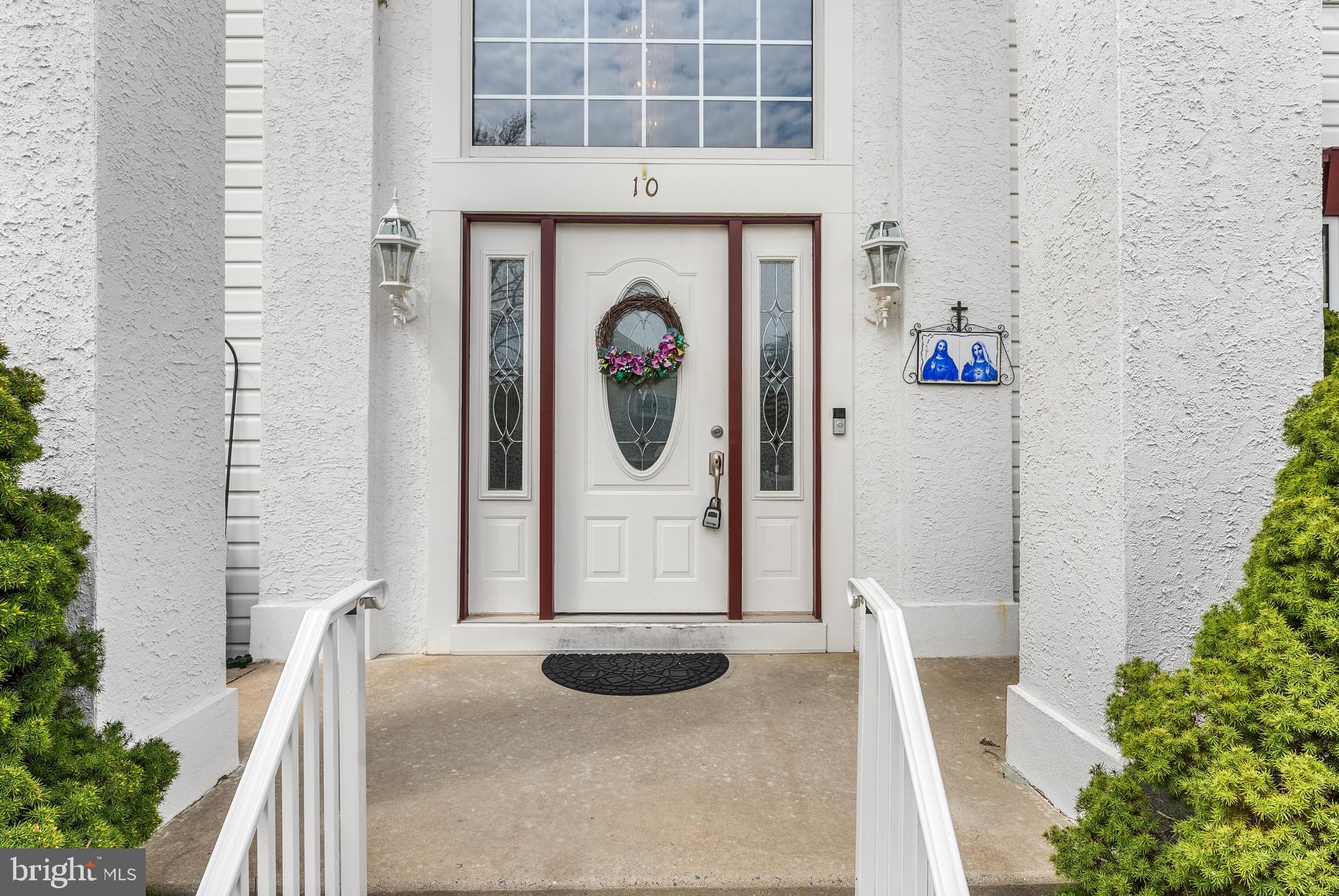 10 Winfield Circle Sewell, NJ 08080 - Photo 35 of 37 a front view of a house with entryway