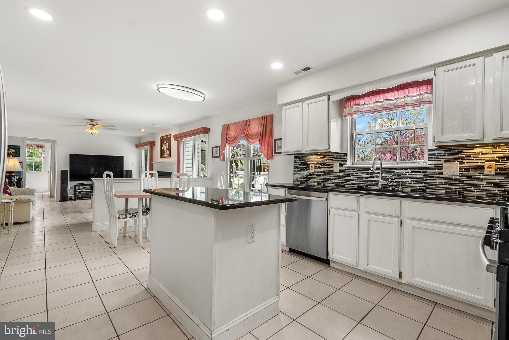 10 Winfield Circle Sewell, NJ 08080 - Photo 4 of 37 a kitchen with stainless steel appliances a sink stove and cabinets