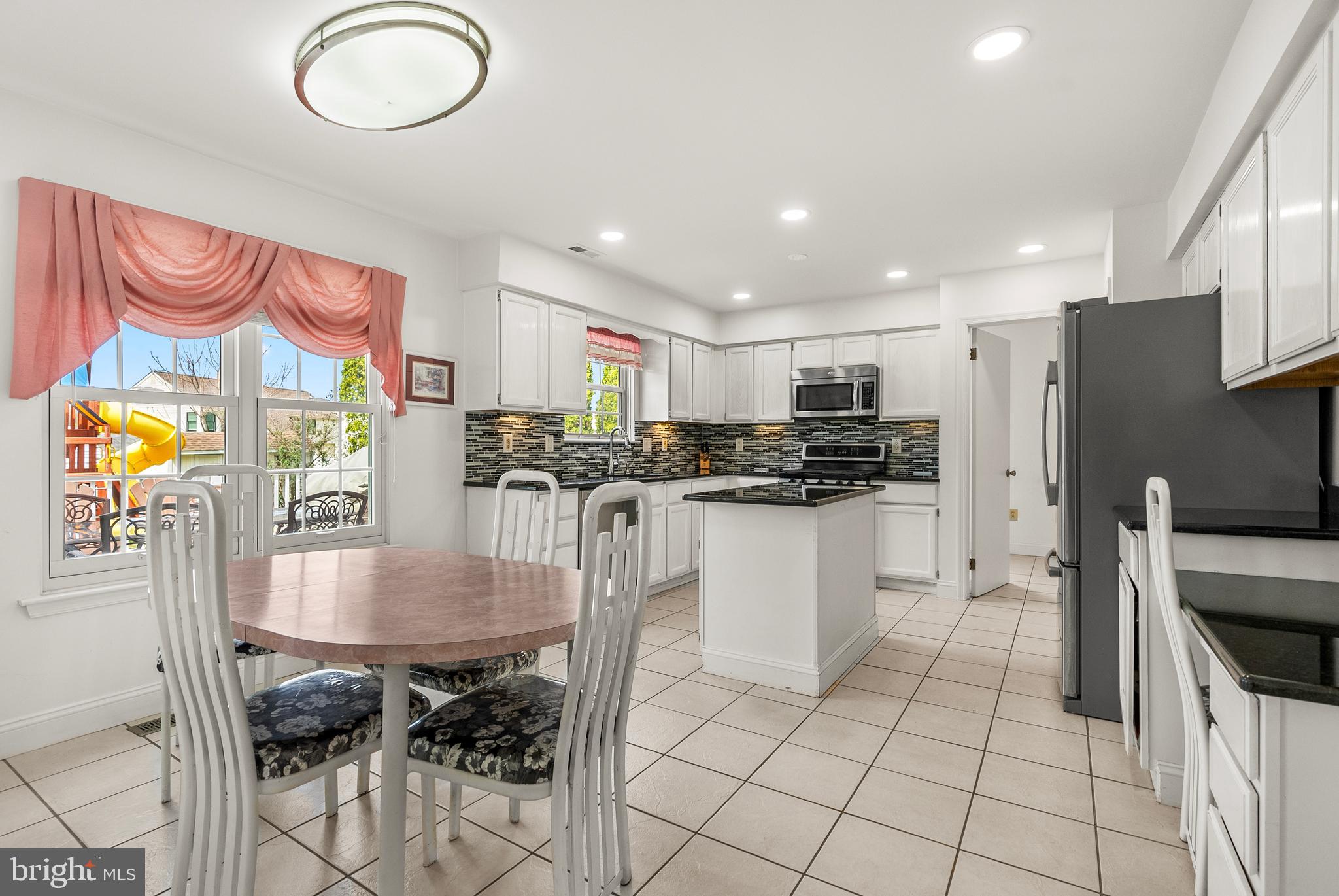 10 Winfield Circle Sewell, NJ 08080 - Photo 5 of 37 a kitchen with stainless steel appliances granite countertop a stove a sink and a refrigerator