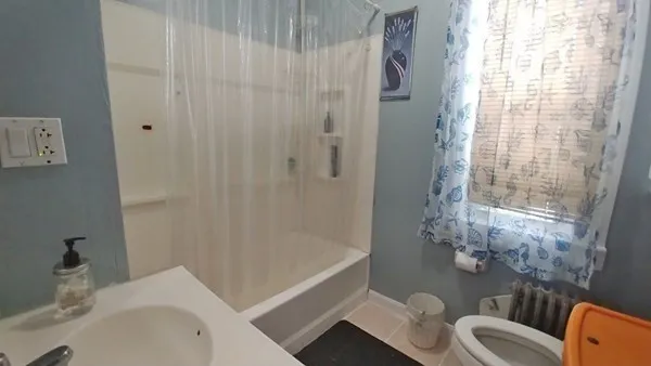 a bathroom with a sink and a bathtub