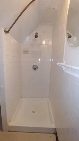 a bathroom with a bath tub