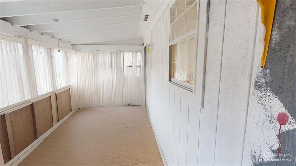 5 Douglas Lane Wareham, MA 02538 - Photo 9 of 15 a view of a hallway with windows