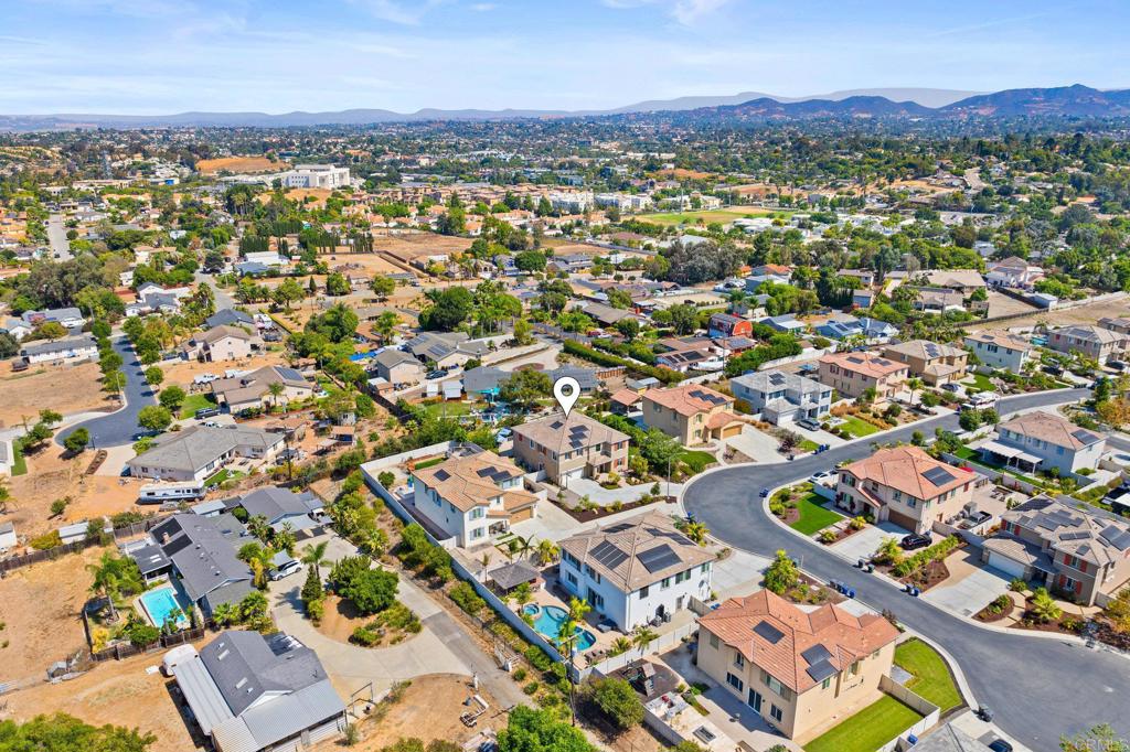 1211 Tesoro Place Vista, CA 92081 - Photo 52 of 57 an aerial view of residential houses with outdoor space