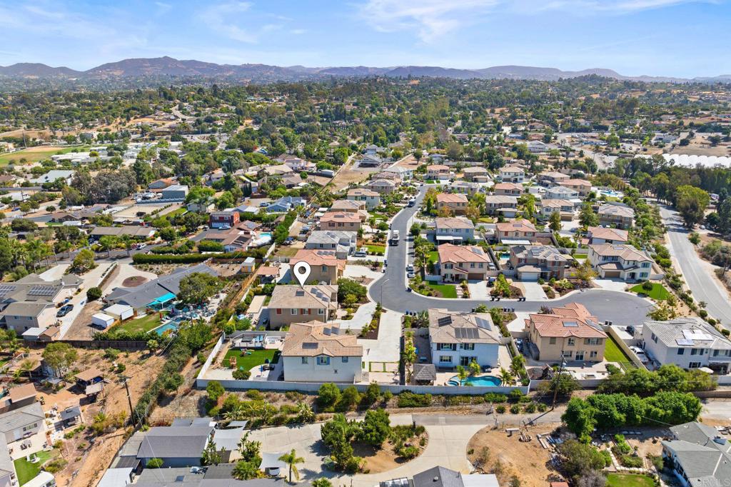 1211 Tesoro Place Vista, CA 92081 - Photo 53 of 57 an aerial view of residential houses with outdoor space