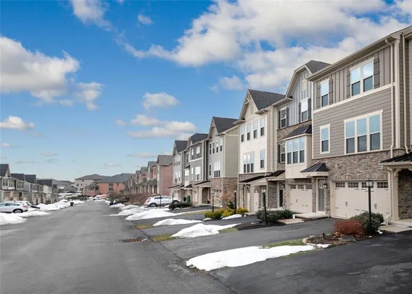 a city street lined with tall buildings