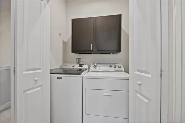 a bathroom with a sink toilet and mirror