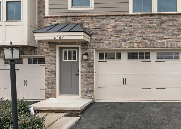 a view of bathroom with wooden floor