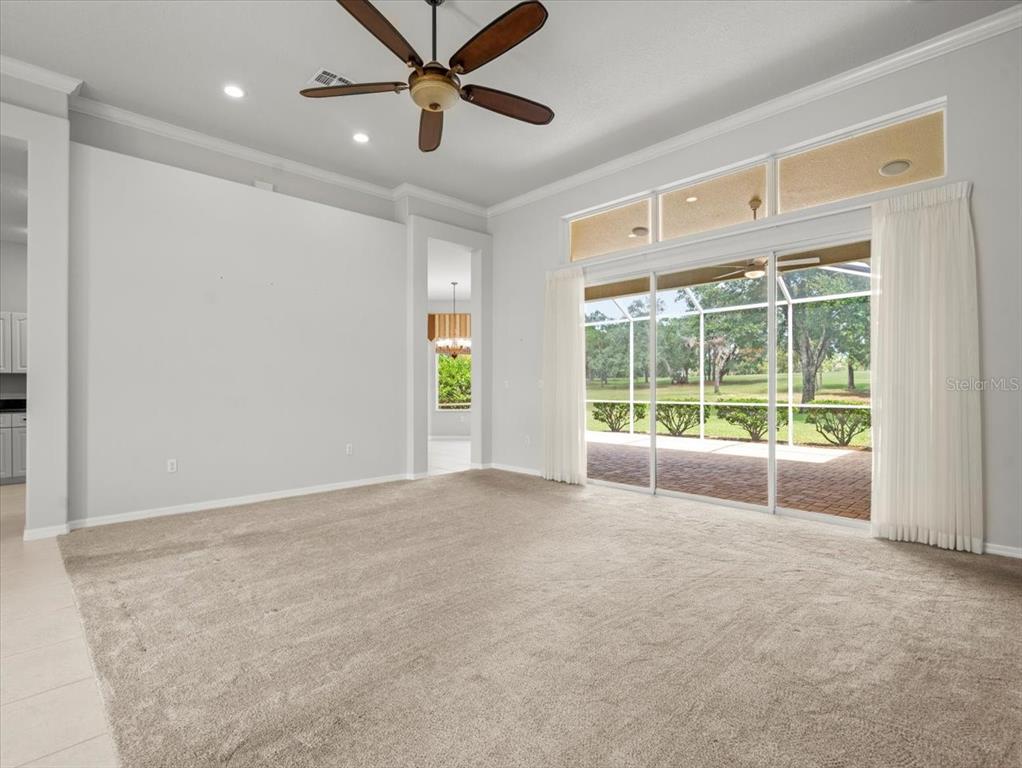 9037 Penelope Drive Weeki Wachee, FL 34613 - Photo 12 of 60 a view of an empty room with a window