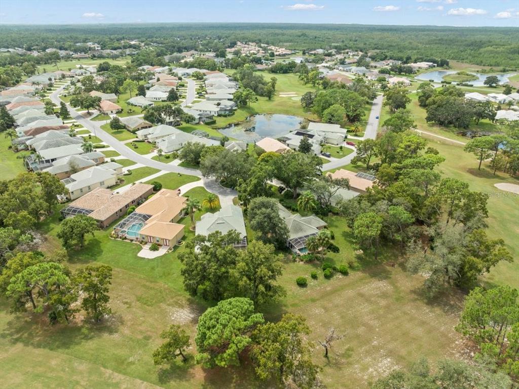 9037 Penelope Drive Weeki Wachee, FL 34613 - Photo 58 of 60 a view of a city with an outdoor space