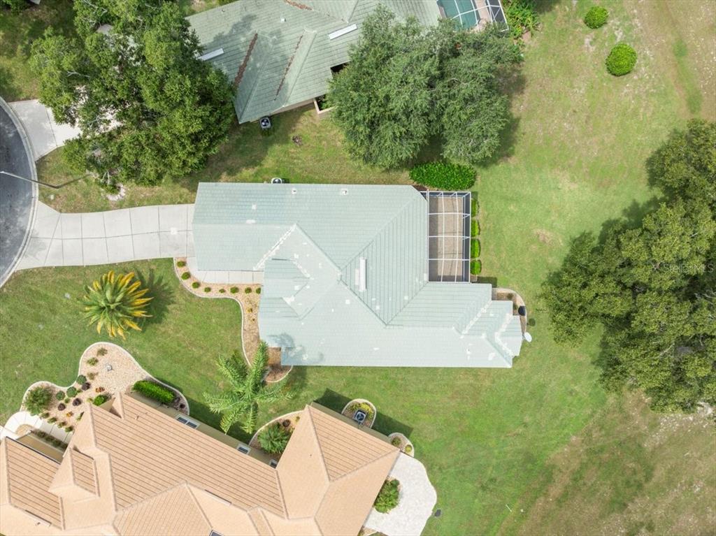 9037 Penelope Drive Weeki Wachee, FL 34613 - Photo 60 of 60 an aerial view of a house with swimming pool