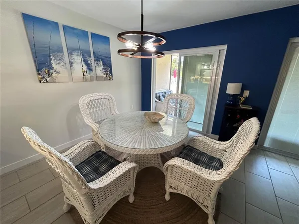a view of a livingroom with furniture and windows