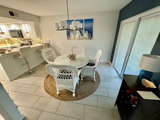 a view of a dining room with furniture