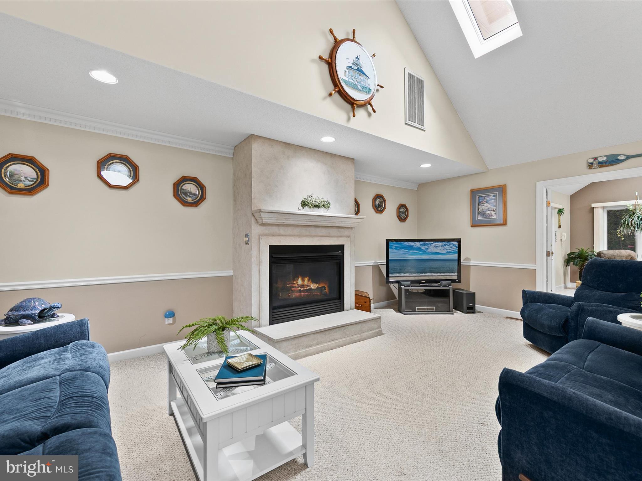 982 Turtle Drive Bethany Beach, DE 19930 - Photo 11 of 73 a living room with furniture and a fireplace