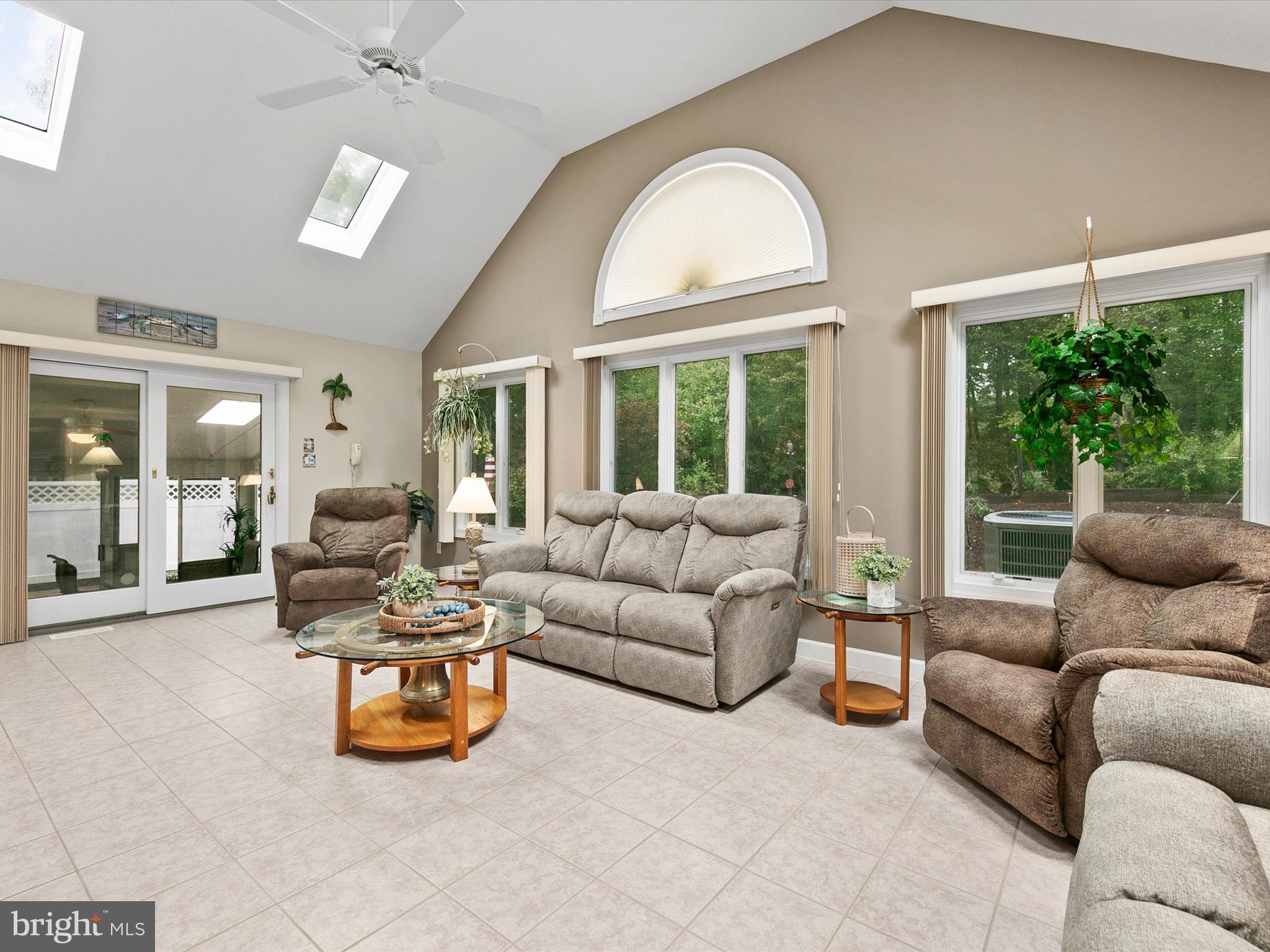 982 Turtle Drive Bethany Beach, DE 19930 - Photo 15 of 73 a living room with furniture and a large window
