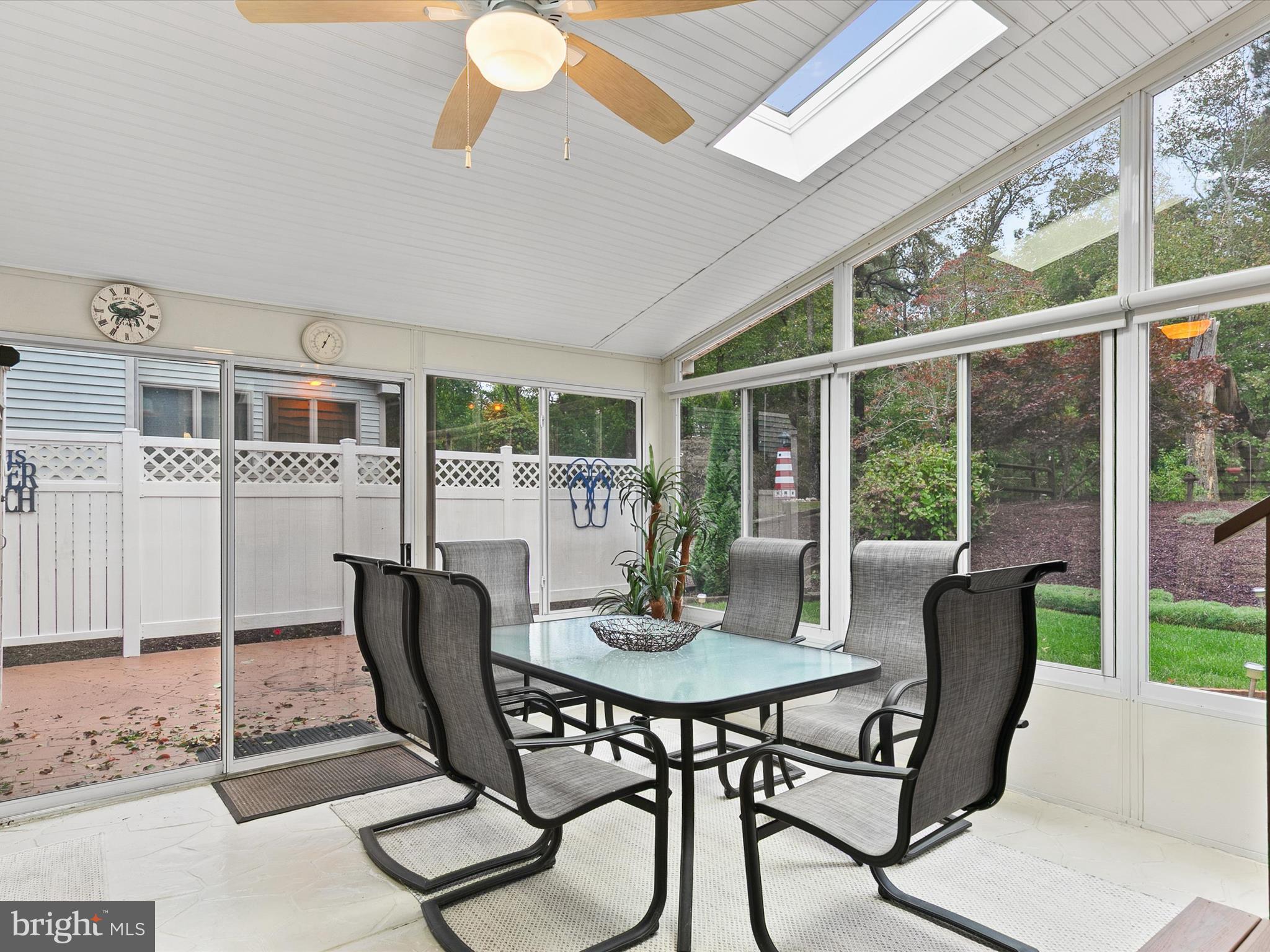 982 Turtle Drive Bethany Beach, DE 19930 - Photo 17 of 73 a view of a dining room with furniture window and outside view