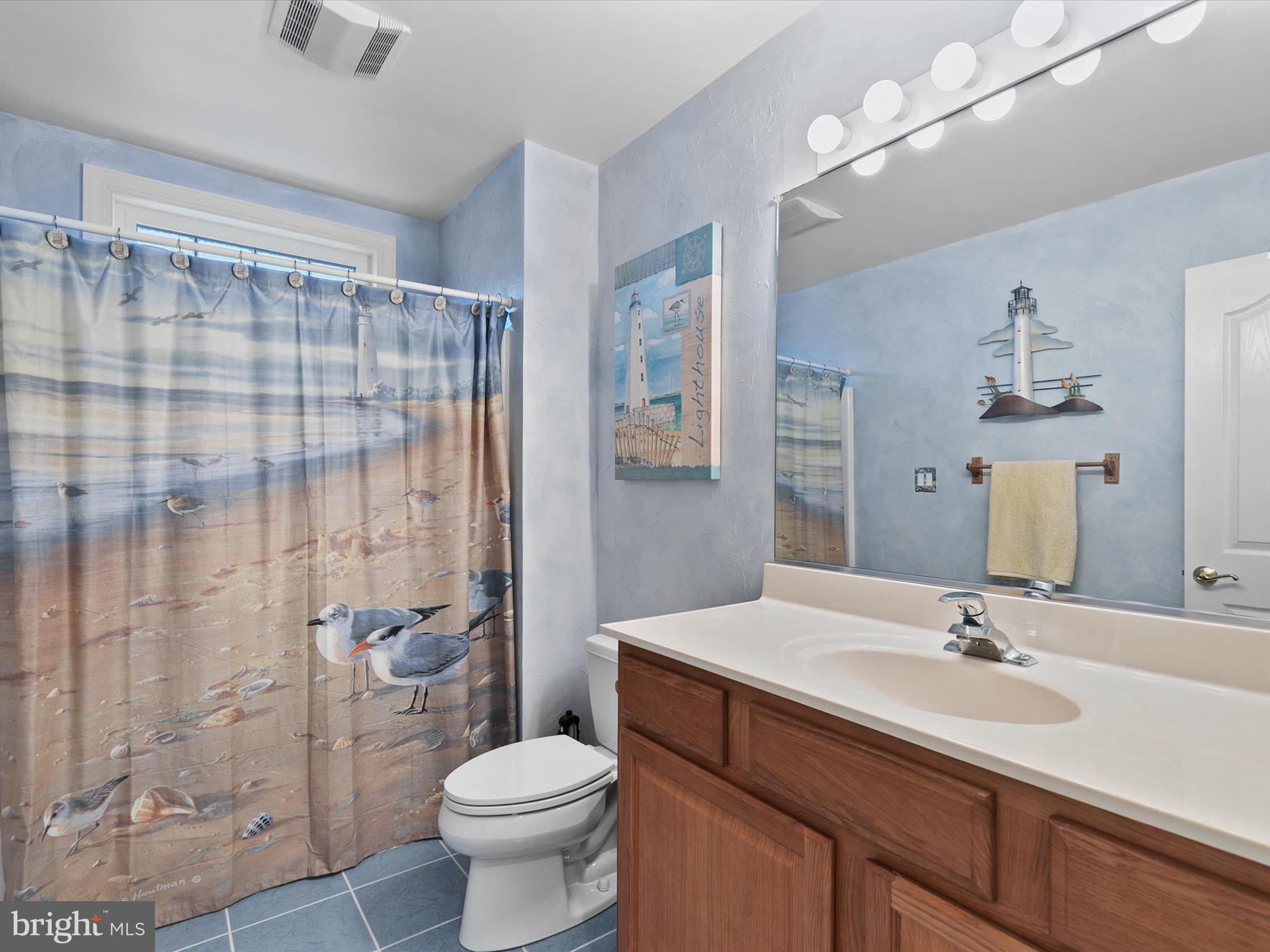982 Turtle Drive Bethany Beach, DE 19930 - Photo 26 of 73 a bathroom with a sink toilet double vanity and shower