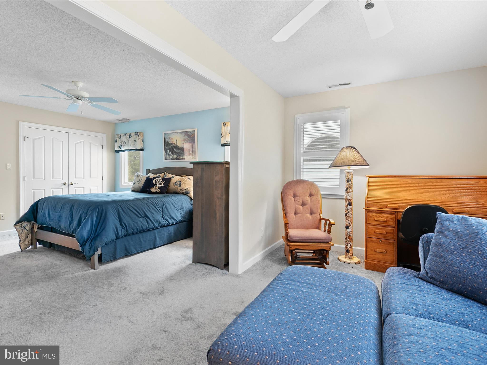 982 Turtle Drive Bethany Beach, DE 19930 - Photo 30 of 73 a bedroom with a bed and a couch