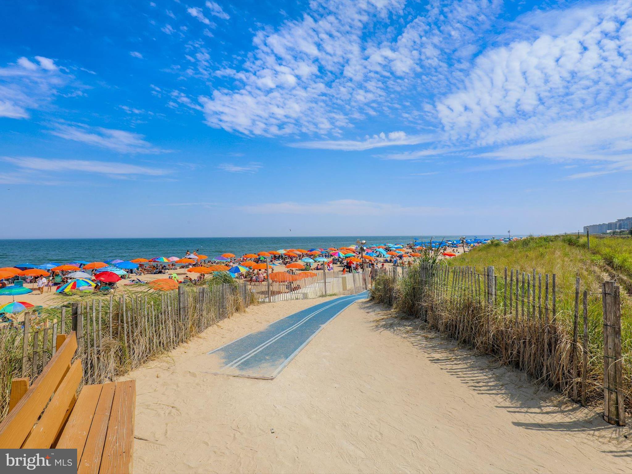 982 Turtle Drive Bethany Beach, DE 19930 - Photo 60 of 73 a view of a pathway with a wrought fence