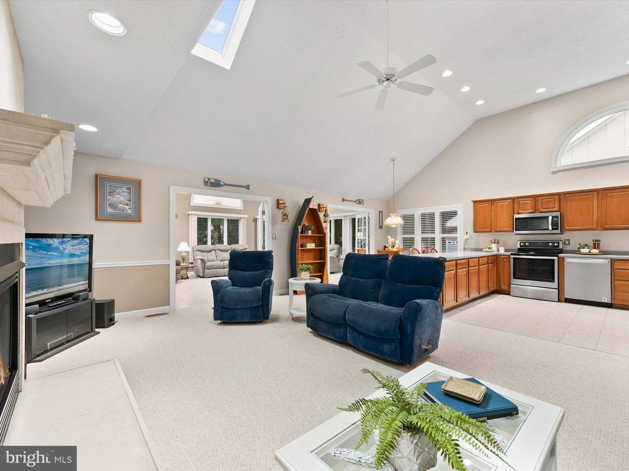 982 Turtle Drive Bethany Beach, DE 19930 - Photo 10 of 73 a living room with furniture and a flat screen tv